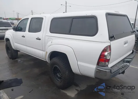 2013 Toyota Tacoma Base V6 z USA, uszkodzony, nr VIN 3TMLU4EN9DM113624